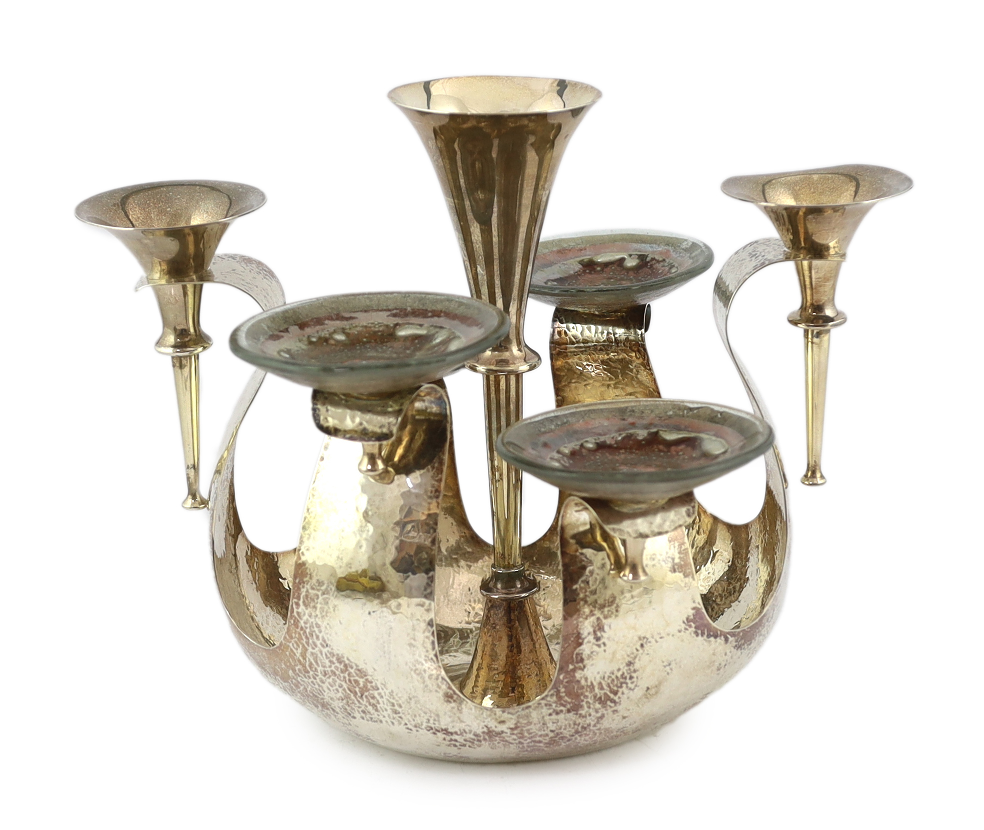 An Elizabeth II Arts & Crafts planished silver centrepiece epergne by Pruden & Smith of Ditchling, with three silver trumpet receivers and four glass dishes by Lara Aldridge